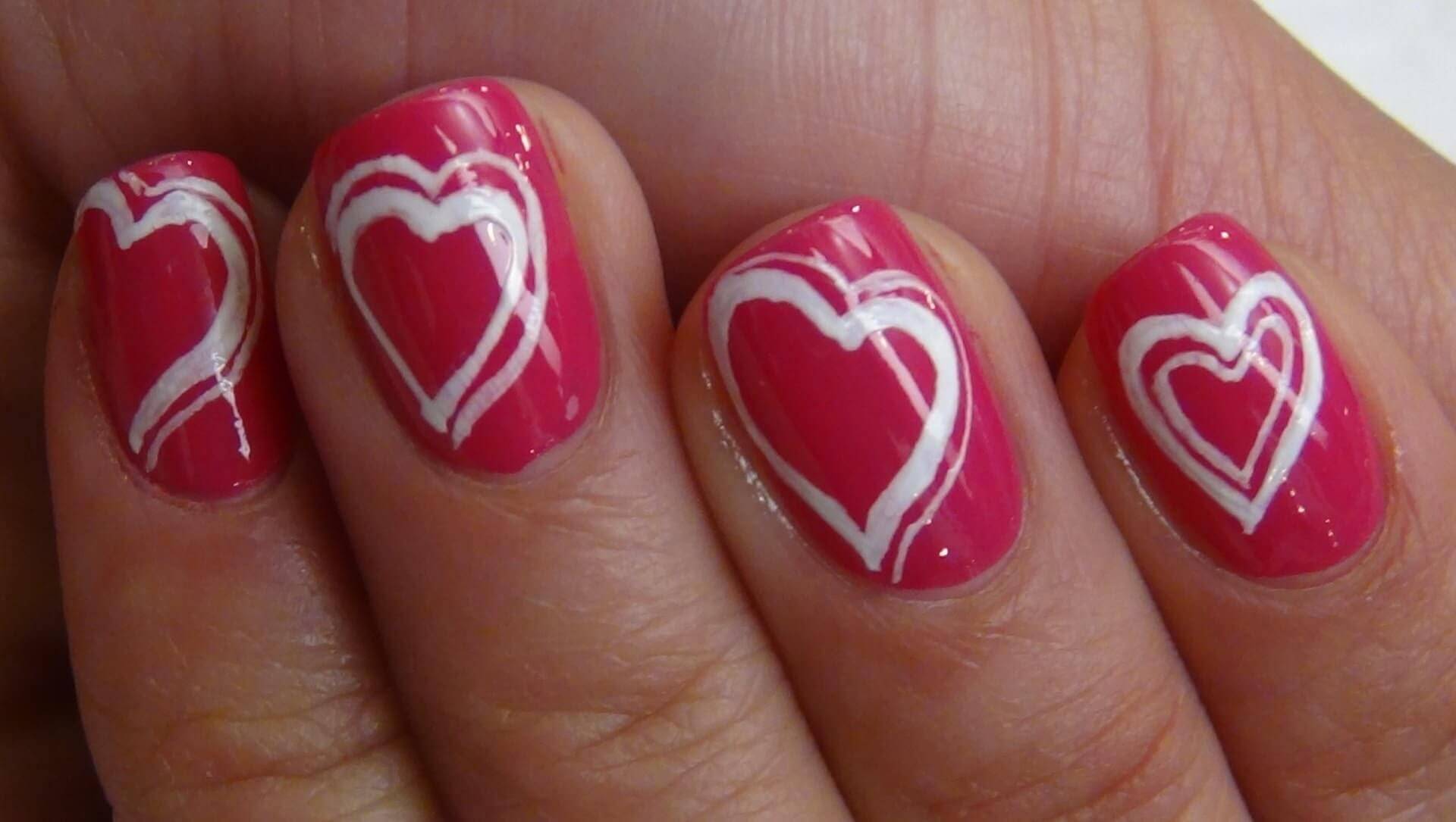Маникюр с сердечками на ногтях ко дню святого валентина