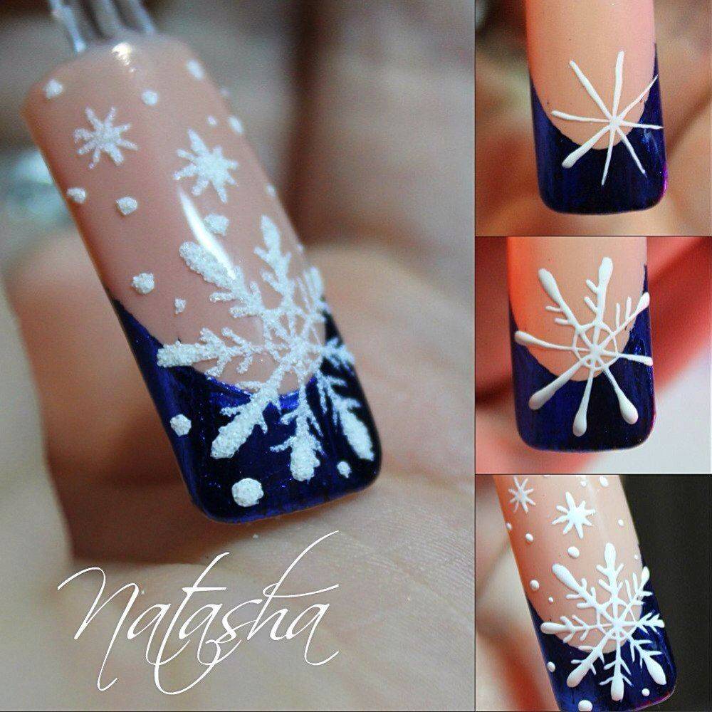 Стильный элемент новогоднего образа: снежинки на ногтях. фото новогоднего маникюра
